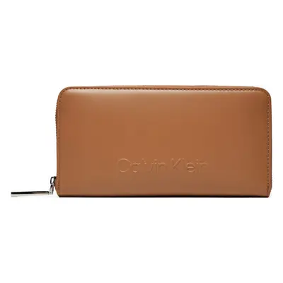 Velká dámská peněženka Calvin Klein Embossed Logo Zip Lg Wallet K60K612439 Hnědá