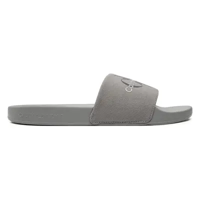 Nazouváky Calvin Klein Jeans Slide Monogram Co YM0YM00061 Šedá