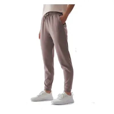 Dámské tepláky 4F TROUSERS-AW23TTROF507-83S-BEIGE