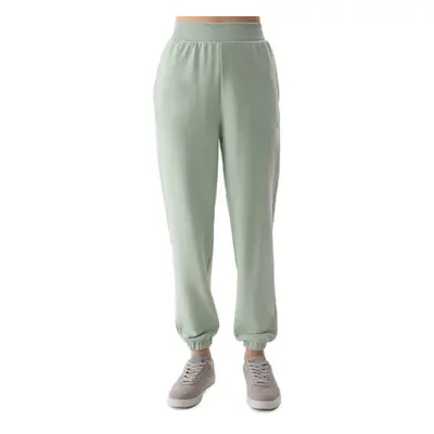 Dámské tepláky 4F TROUSERS-4FWSS24TTROF666-42S-LIGHT GREEN