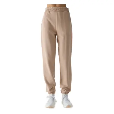 Dámské tepláky 4F TROUSERS-4FWSS24TTROF665-83S-BEIGE