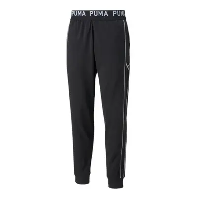 Pánské kalhoty Train Knit Jogger M 521837 01 - Puma