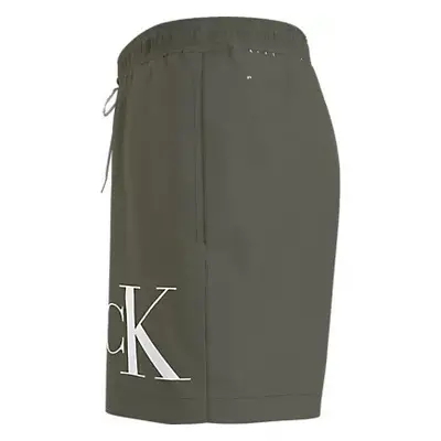 Pánské plavky MEDIUM DRAWSTRING KM0KM01003 LDY olivově zelené - Calvin Klein