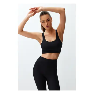 Trendyol Black Brushed Soft Fabric Supported/Shaping Printed Knitted Sports Bra