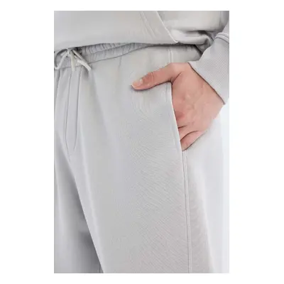 DEFACTO Regular Fit Regular Cut Pocket Waist Tie Elastic Leg Sweatpants