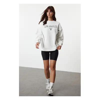 Trendyol Ecru Slogan Printed Oversize/Wide Fit Thick Inside Fleece Knitted Sweatshirt