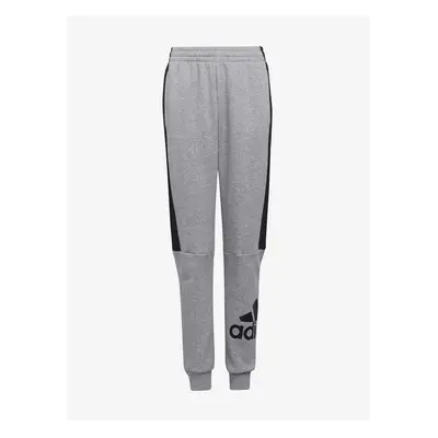 Šedé klučičí žíhané tepláky adidas Performance - unisex