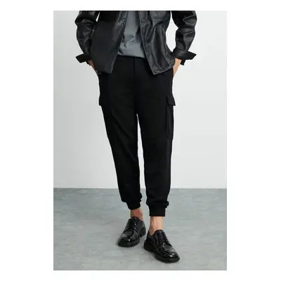 GRIMELANGE Leroy Men's Thick Textured Fabric Pocket Wide Cut Elastic Waist Black Trousers with V