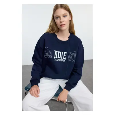 Trendyol Navy Blue Slogan Printed Oversize/Wide Fit Knitted Sweatshirt with Hem Detail