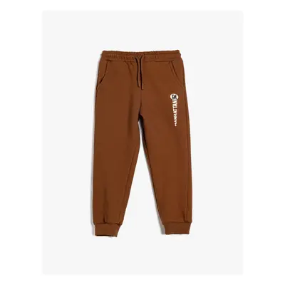 Koton Tracksuit Bottoms with Tied Waist and College Printed Pocket Detail