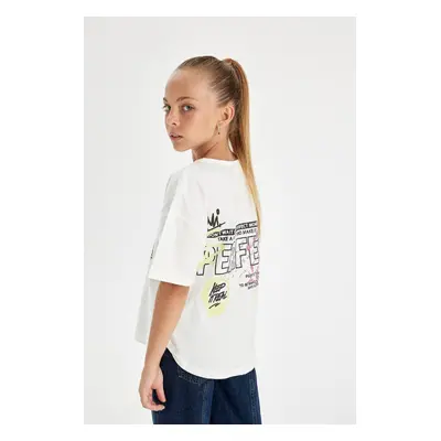 DEFACTO Girl Oversize Wide Pattern Crew Neck Back Printed Short Sleeve T-Shirt