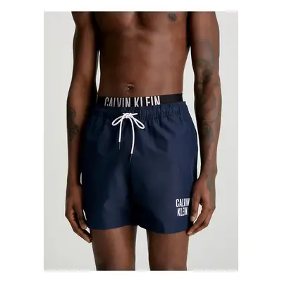 Tmavě modré pánské plavky Calvin Klein Underwear - Pánské