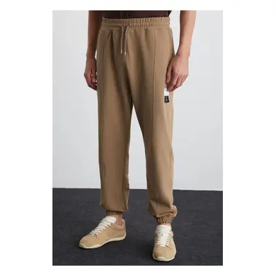 GRIMELANGE Rowan Men's Relaxed, Ribbed Front, Decorative Labeled, Mink Sweatpants