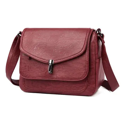 Retro crossbody s kapsami Barva: Vínová