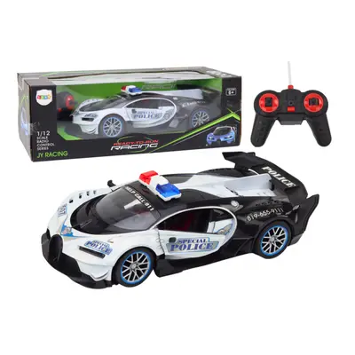 RC policejní auto 1:12 bílé