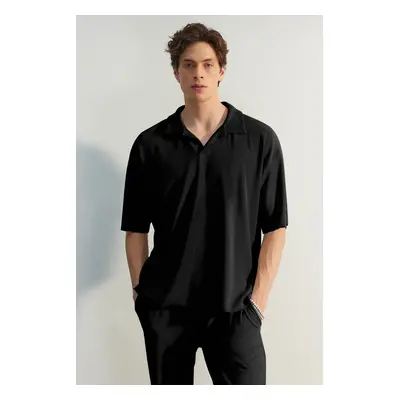 Trendyol Limited Edition Black Oversize/Wide Cut Textured Wrinkle-Free Ottoman Polo Neck T-Shirt