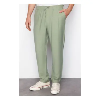 Trendyol Light Khaki Tapered Elastic Waist Tied Linen Look Trousers