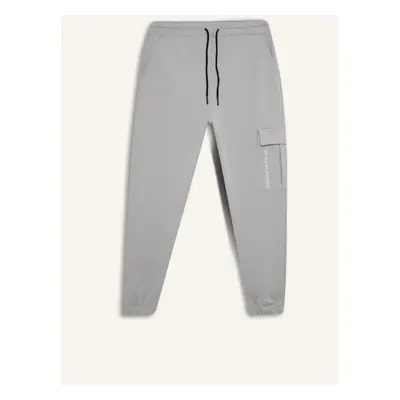 DeFactoFit Sports Jogger Sweatpants Standard Fit Three Pockets Waist Tie Elastic Leg