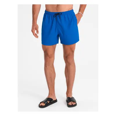 Ombre Neon men's swim shorts with magic print effect - blue