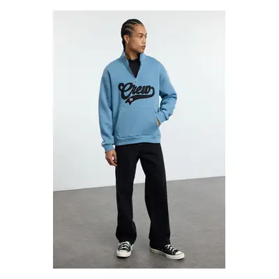 Trendyol Blue Stand Collar Oversize/Wide Cut Stand Collar Zippered Text Embroidered Sweatshirt