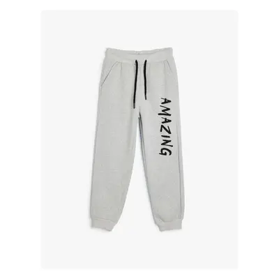 Koton Jogger Sweatpants with Tied Waist and Sports Print Detail