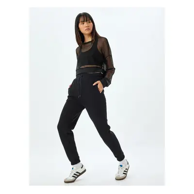 Koton Jogger High Waist Sweatpants with Waist Tie Pocket Detail and Raised Waist