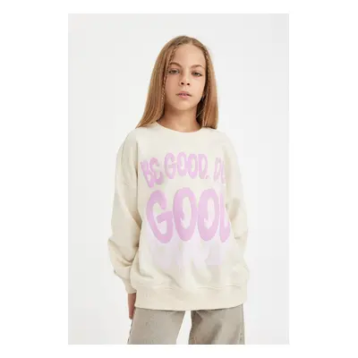 DEFACTO Girl Oversize Wide Pattern Crew Neck Printed Sweatshirt