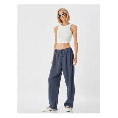 Koton Comfortable Fit Textured Waist Tied Trousers