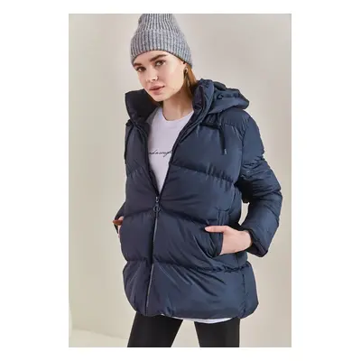 Bianco Lucci Women's Long puffer jacket with a Lace-up hood.