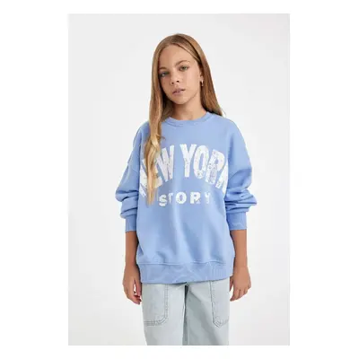 DEFACTO Girl Oversize Wide Pattern Crew Neck Printed Sweatshirt