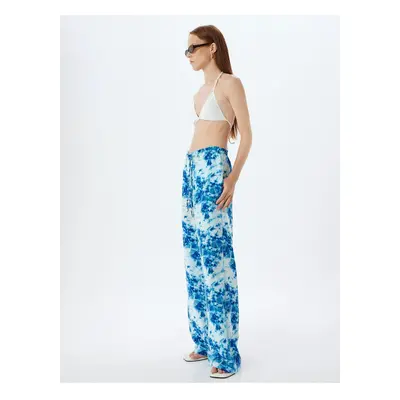 Koton X Şahika Ercümen - Viscose Trousers with Batik Pattern and Wide Leg