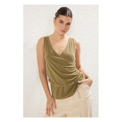 Trendyol Green Modal Asymmetrical Knitted Blouse with Double Breasted Closure