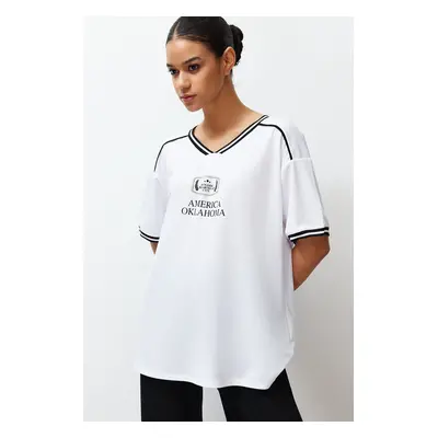 Trendyol White Slogan Printed Oversize/Wide Cut V-Neck Knitted T-Shirt