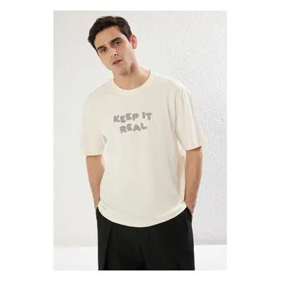 Trendyol Ecru Oversize/Wide Cut Crew Neck Text Embroidered Short Sleeve T-Shirt