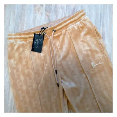 Velúrové tepláky Karl Kani Small Signature Monogram Velvet Pants sand