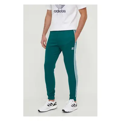 Tepláky adidas Originals zelená barva, s aplikací, IR9886