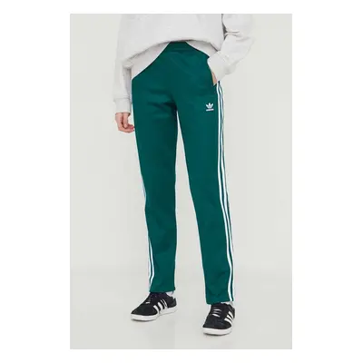 Tepláky adidas Originals zelená barva, s aplikací, IP0628