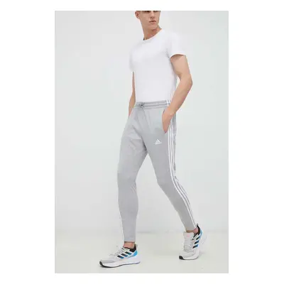 Tréninkové kalhoty adidas Essentials šedá barva, melanžové, IC0046