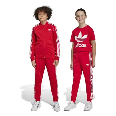 Dětské tepláky adidas Originals červená barva, vzorované