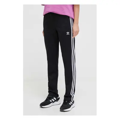 Tepláky adidas Originals černá barva, vzorované, IU2521