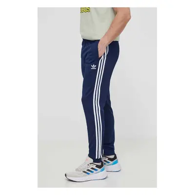 Tepláky adidas Originals Adicolor Classics SST tmavomodrá barva, s aplikací, IR9887