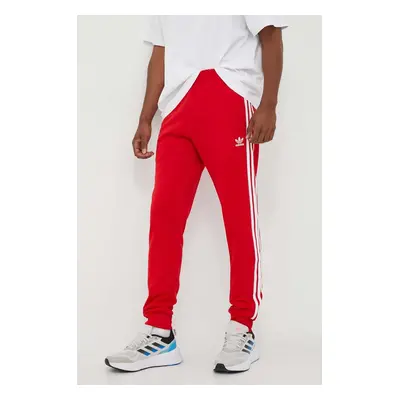 Tepláky adidas Originals Adicolor Classics SST Track Pants červená barva, s aplikací, IM4543