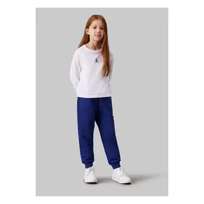 Dětské bavlněné tepláky Calvin Klein Jeans SWEATPANTS modrá barva, s potiskem, IU0IU00285