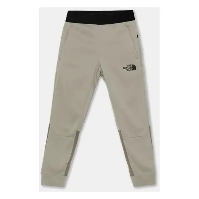 Dětské tepláky The North Face MOUNTAIN ATHLETICS JOGGERS béžová barva, vzorované, NF0A89HW5II1