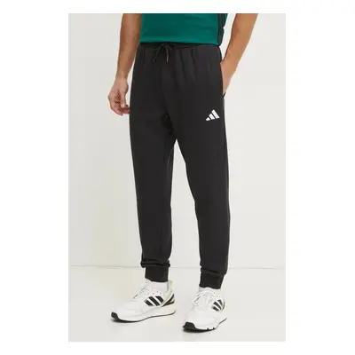 Tepláky adidas Feelcozy černá barva, hladké, JE3815