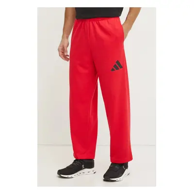 Tepláky adidas Essentials červená barva, hladké, JF3601