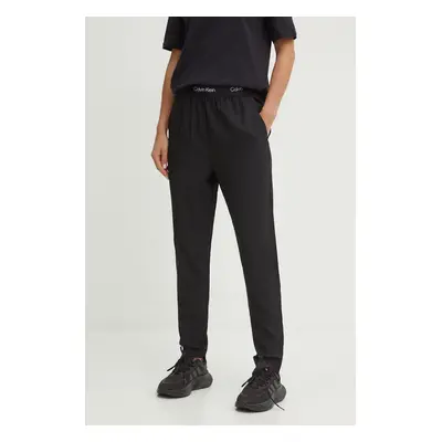 Tréninkové kalhoty Calvin Klein Performance černá barva, přiléhavé, medium waist, 00GWS4P601