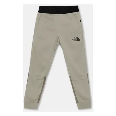 Dětské tepláky The North Face MOUNTAIN ATHLETICS JOGGERS béžová barva, vzorované, NF0A89HW5II1