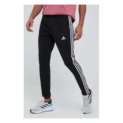 Tréninkové kalhoty adidas Essentials černá barva, s aplikací, IC0044