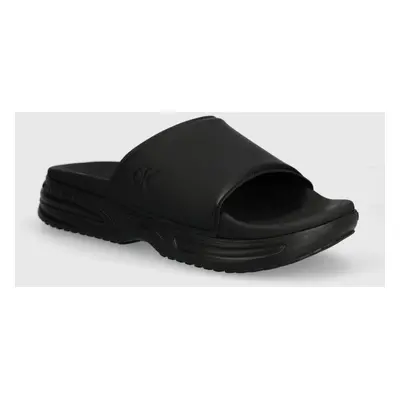 Pantofle Calvin Klein Jeans CHUNKY COMF SLIDE MINIMAL RAW pánské, černá barva, YM0YM00956